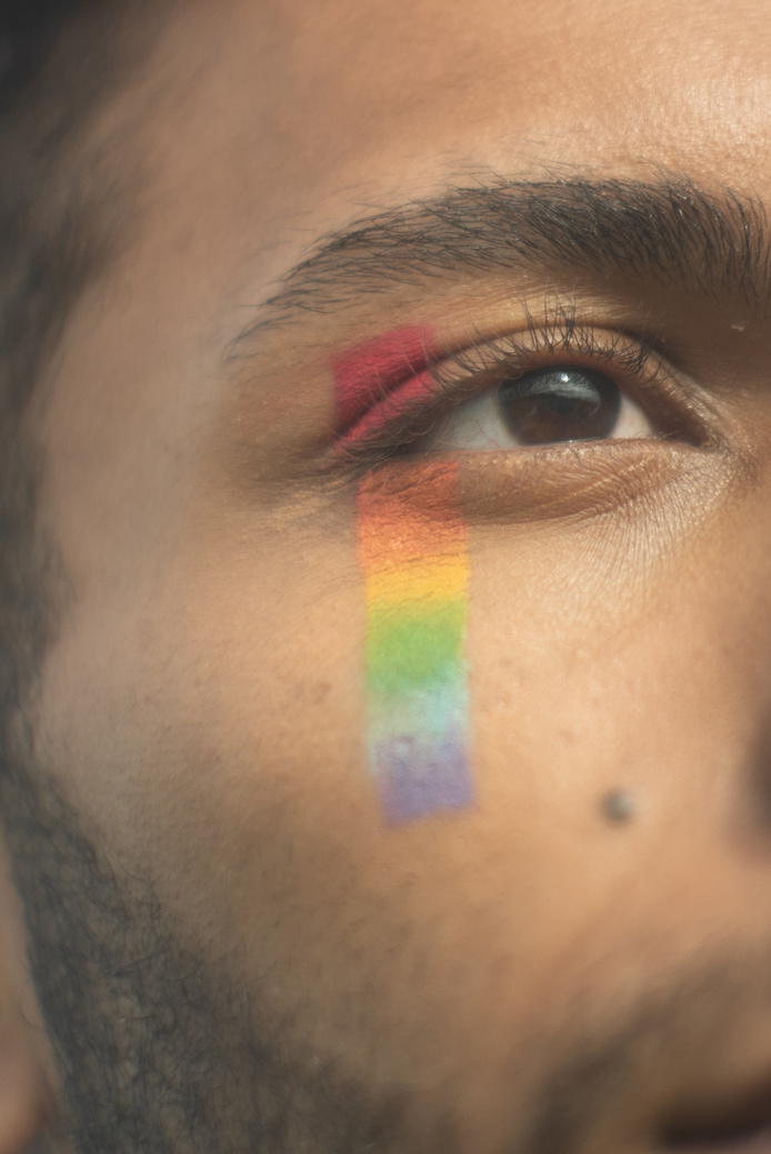 Gay Man with Rainbow Makeup